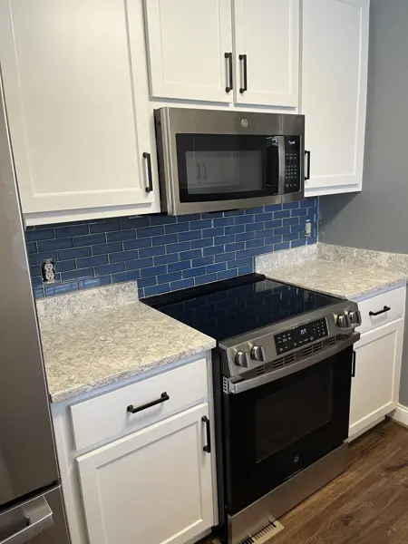 After: backsplash behind the range