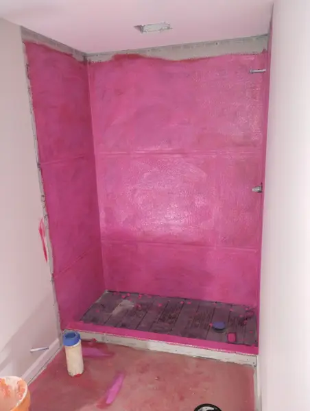 During: shower walls and bench waterproofed
