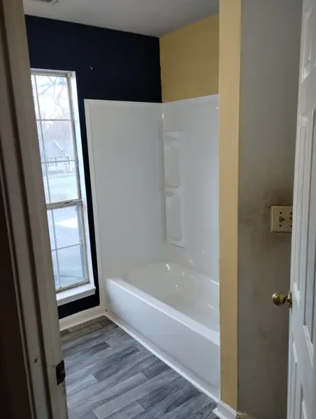 Tub surround and new floor